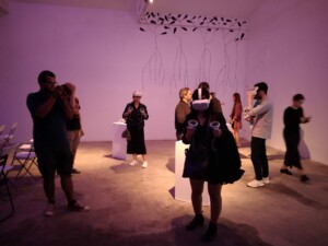 Group of people using virtual reality headsets in a room